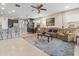 Open-concept living area seamlessly connects a cozy living room to a stylish kitchen at 602 Cabernet Way, Oldsmar, FL 34677