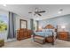 Inviting main bedroom featuring beautiful furnishings, soothing colors and lots of natural light at 602 Cabernet Way, Oldsmar, FL 34677
