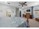 This main bedroom is spacious and includes en suite bathroom and walk in closet at 602 Cabernet Way, Oldsmar, FL 34677