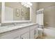 Bathroom featuring a double sink granite vanity and shower/tub combo at 6326 Waves End Pl, Apollo Beach, FL 33572