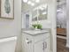 Stylish bathroom with granite countertop, modern fixtures, and neutral paint at 6326 Waves End Pl, Apollo Beach, FL 33572