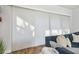 Bright living room with hardwood floors, stylish window treatments, and comfortable seating at 6326 Waves End Pl, Apollo Beach, FL 33572