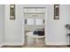 Bright, modern living room with hardwood floors and comfortable seating area, perfect for relaxation at 6326 Waves End Pl, Apollo Beach, FL 33572