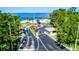 Gated beach access with palm trees and sandy beach on a bright day at 6533 Channelside Dr, New Port Richey, FL 34652