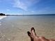 Relaxing beach view with clear water and sunny skies, perfect for vacation at 6533 Channelside Dr, New Port Richey, FL 34652
