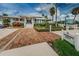 The property has a private clubhouse with well manicured landscaping and brick paver entry at 6533 Channelside Dr, New Port Richey, FL 34652