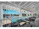 Enjoy beautiful waterfront views from the clubhouse patio overlooking a swimming pool and the bay at 6533 Channelside Dr, New Port Richey, FL 34652