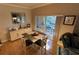The dining area features a small table with seating for four at 6533 Channelside Dr, New Port Richey, FL 34652