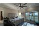 Main bedroom with stylish furnishings, lots of natural light, and unique design touches at 6533 Channelside Dr, New Port Richey, FL 34652