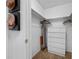 Inside a closet with an ironing board, a dresser and decor at 6920 Lafayette N # 6920, Pinellas Park, FL 33781