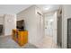 Hallway with closet, entertainment center, and half bath at 6920 Lafayette N # 6920, Pinellas Park, FL 33781