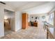 Open kitchen featuring tile floors, a desk area, and a breakfast nook with bright natural light at 6920 Lafayette N # 6920, Pinellas Park, FL 33781