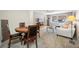 Open-concept living and dining area with neutral tones at 6920 Lafayette N # 6920, Pinellas Park, FL 33781