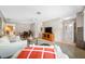 Open living area with carpet, and an adjacent bathroom at 6920 Lafayette N # 6920, Pinellas Park, FL 33781