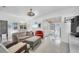 Cozy living room featuring neutral-toned furniture and bright white walls at 8031 7Th N St, St Petersburg, FL 33702