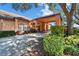 Attractive community building with lush landscaping and a welcoming entrance at 8528 Fantasia Park Way, Riverview, FL 33578