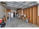 Open garage with storage space, offering potential for customization at 8528 Fantasia Park Way, Riverview, FL 33578
