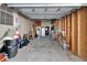 Spacious garage featuring a concrete floor and ample storage space at 8528 Fantasia Park Way, Riverview, FL 33578
