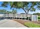 Community mailboxes under a lush, mature tree, providing a convenient and accessible amenity at 8528 Fantasia Park Way, Riverview, FL 33578