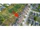 Aerial view of the home in neighborhood at 8975 Southern Charm Cir, Brooksville, FL 34613