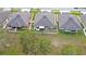 A high angle shot showing fenced yards and patios at 8975 Southern Charm Cir, Brooksville, FL 34613