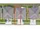 This aerial view displays the back of the homes, the neatly manicured lawn and a white fence at 8975 Southern Charm Cir, Brooksville, FL 34613