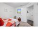 Cozy bedroom with TV and entrance to hallway, bright and cheery at 8975 Southern Charm Cir, Brooksville, FL 34613