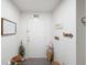 A welcoming entryway decorated with seasonal decor and featuring wood-look floors at 8975 Southern Charm Cir, Brooksville, FL 34613