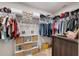 Spacious walk-in closet with ample storage and organization features at 8975 Southern Charm Cir, Brooksville, FL 34613