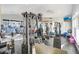 Bright gym features modern machines, weights, and wall-mounted TV for entertainment during workouts at 9481 Highland Oak Dr # 514, Tampa, FL 33647