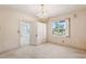 Bedroom featuring a chandelier and a built-in wardrobe, providing ample storage at 101 Pampas Ave, Tarpon Springs, FL 34689