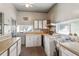 Laundry room with white cabinets, wood countertops, sink, and utility connections at 101 Pampas Ave, Tarpon Springs, FL 34689