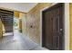 Unit entrance with outdoor hallway and stairs at 10103 Courtney Oaks Cir # 103, Tampa, FL 33619