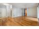 Bright living room featuring hardwood floors and neutral walls at 10103 Courtney Oaks Cir # 103, Tampa, FL 33619