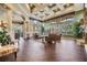 Elegant lounge area with comfortable seating, stylish decor, and natural light, perfect for relaxation at 10103 Courtney Oaks Cir # 103, Tampa, FL 33619