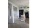 Open concept kitchen with black appliances, white cabinets, and eat-in kitchen island at 10106 66Th Ave, Seminole, FL 33772