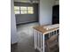 Open living room area with neutral walls, ceiling fan, and lots of natural light at 10106 66Th Ave, Seminole, FL 33772