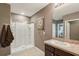Bathroom with enclosed shower and single vanity at 10230 Geese Trail Cir, Sun City Center, FL 33573