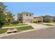 Two-story home with a driveway and attached garage at 10230 Geese Trail Cir, Sun City Center, FL 33573