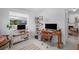 Bright bedroom with modern computer setup and seating at 1137 86Th N Ave, St Petersburg, FL 33702