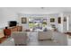 Inviting living room with cozy seating, bay window, and contemporary furnishings for a welcoming space at 1137 86Th N Ave, St Petersburg, FL 33702
