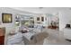 Bright and airy living room with bay window, comfortable seating, and stylish décor at 1137 86Th N Ave, St Petersburg, FL 33702