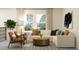 Comfortable living room with stylish decor, large windows, and a cozy atmosphere for relaxation at 11547 E 71St Ter, Palmetto, FL 34221