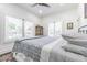 Bedroom with soft lighting, and plentiful windows and a neutral color palette at 1175 Jackson Rd, Clearwater, FL 33755