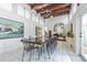 Elegant dining room with high ceilings, decorative lighting and marble floors at 1175 Jackson Rd, Clearwater, FL 33755