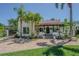 Charming single-Gathering home featuring lush landscaping, a terracotta roof, and a welcoming covered entry at 1175 Jackson Rd, Clearwater, FL 33755