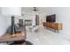 Spacious living room features tile floors and contemporary decor at 1175 Jackson Rd, Clearwater, FL 33755
