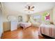 Charming bedroom with twin beds, and a floral motif at 118 94Th Ave, Treasure Island, FL 33706