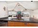 Bright kitchen with breakfast bar open to living area at 118 94Th Ave, Treasure Island, FL 33706