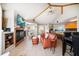 Comfortable living room with fireplace, TV, leather seating and open to the kitchen and dining areas at 118 94Th Ave, Treasure Island, FL 33706